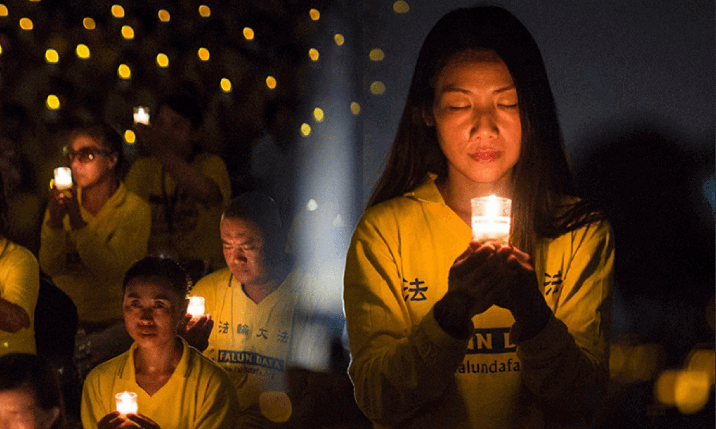 Falun Gong practitioners at the annual candlelight vigil in Washington, D.C. on the anniversary of the persecution, honoring fellow believers in China who have died during the persecution.