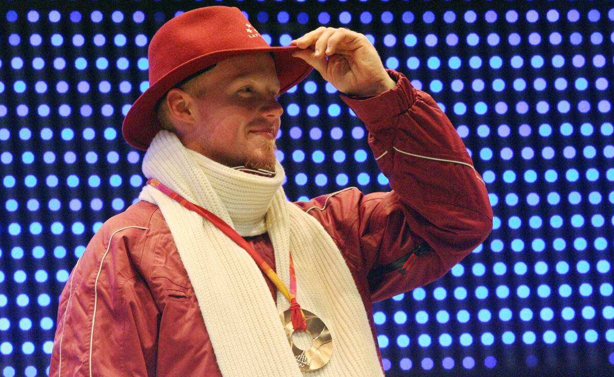 Photo of Martins Rubenis celebrating in 2006, after winning a bronze medal in the Winter Olympics.
